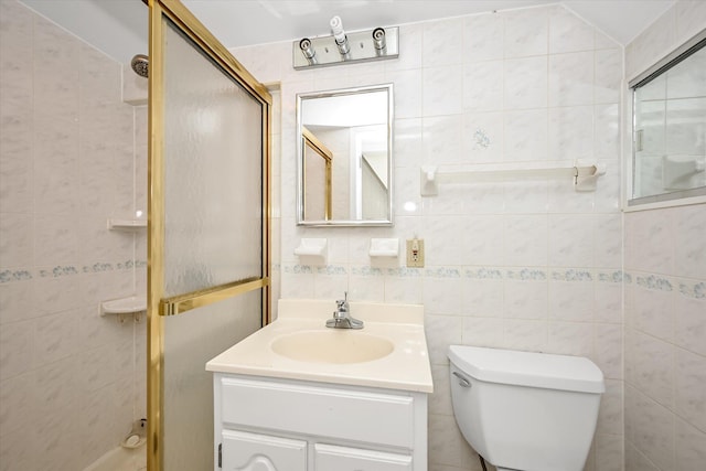 148-35 58th Ave, Flushing, NY 11355 - full bath featuring a shower with shower door, tile walls, vanity, and toilet