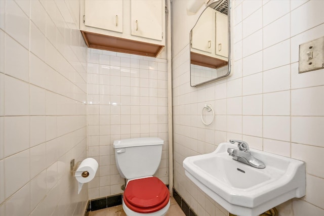 148-35 58th Ave, Flushing, NY 11355 - bathroom with tile walls, a sink, and toilet