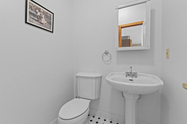 115 Moffat Rd, Washingtonville, NY 10992 - bathroom featuring baseboards, toilet, and a sink