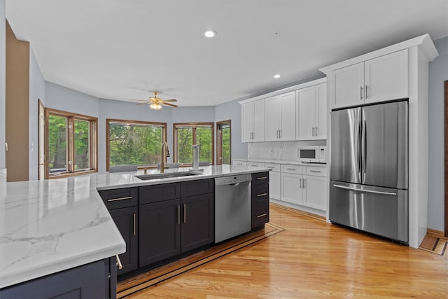 115 Moffat Rd, Washingtonville, NY 10992 - kitchen with stainless steel appliances, a sink, plenty of natural light, ceiling fan, and recessed lighting
