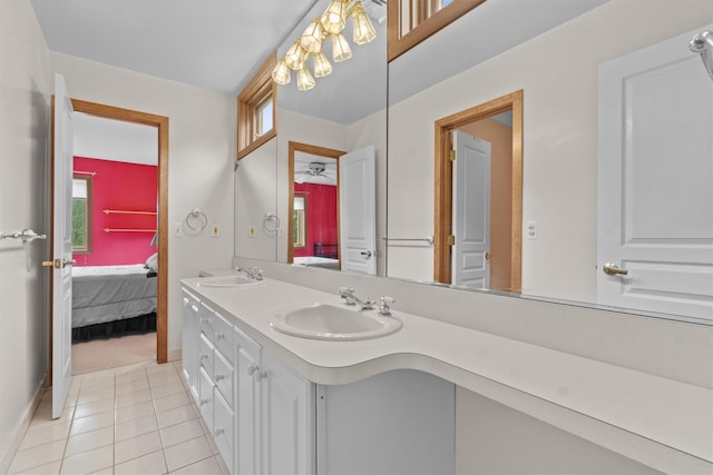 115 Moffat Rd, Washingtonville, NY 10992 - bathroom featuring ensuite bath, tile patterned flooring, double vanity, and baseboards