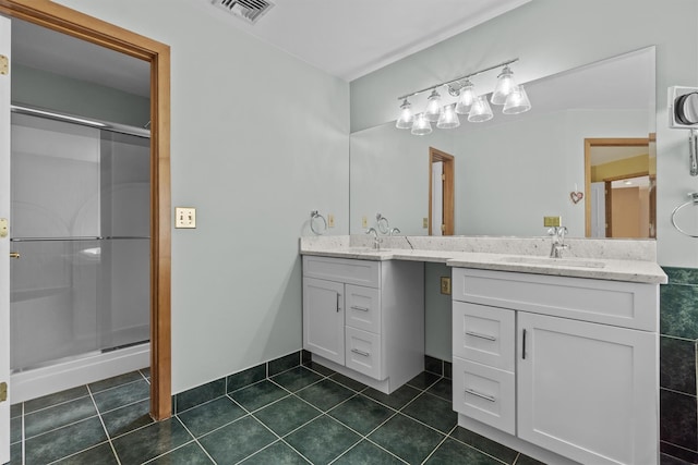 115 Moffat Rd, Washingtonville, NY 10992 - bathroom featuring double vanity, a stall shower, and tile patterned flooring