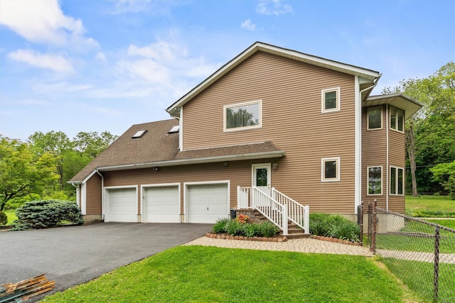 115 Moffat Rd, Washingtonville, NY 10992 - view of front of property featuring driveway and an attached garage