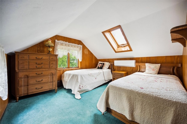 9 Lakeland Ave, Patchogue, NY 11772 - carpeted bedroom with a skylight, lofted ceiling, and wood walls