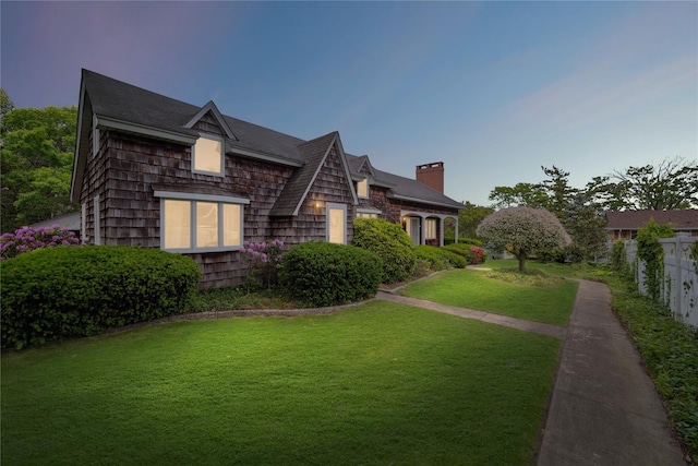 9 Lakeland Ave, Patchogue, NY 11772 - view of property exterior with a chimney