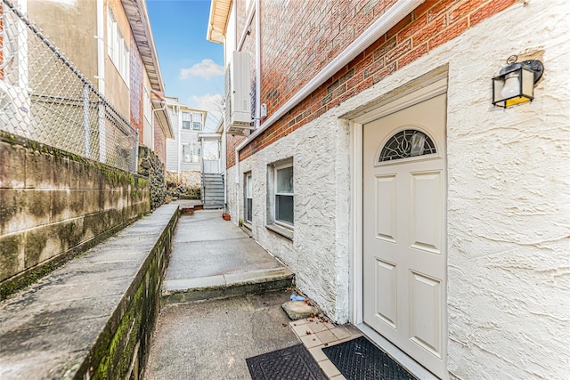 property entrance featuring fence