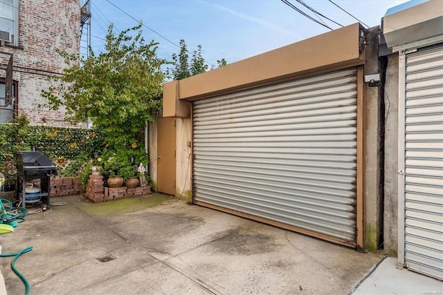 garage with fence