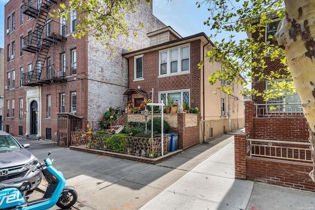 view of front of home with brick siding