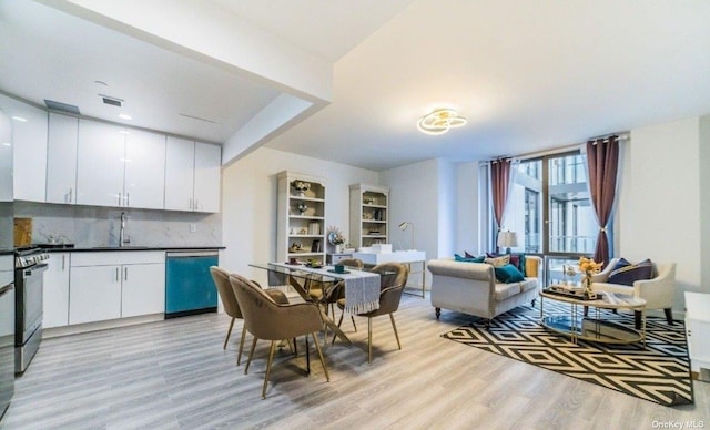 144-27 Sanford Ave Unit 2K, Flushing, NY 11355 - dining area featuring light wood-type flooring