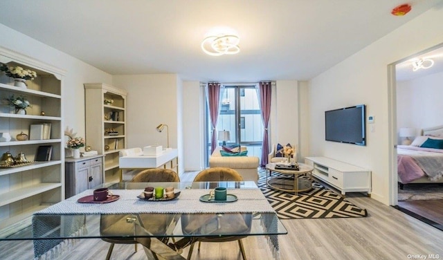 144-27 Sanford Ave Unit 2K, Flushing, NY 11355 - dining area with wood finished floors and baseboards