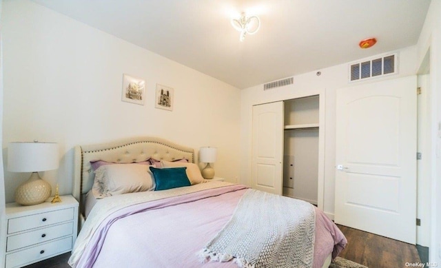144-27 Sanford Ave Unit 2K, Flushing, NY 11355 - bedroom with dark wood-type flooring and a closet