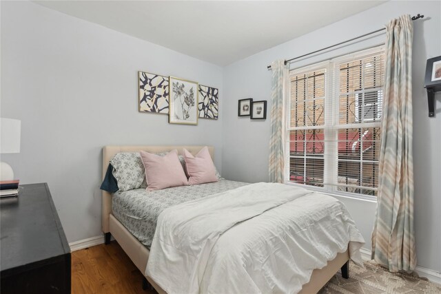 61-31 136th St, Flushing, NY 11367 - bedroom with baseboards and wood finished floors