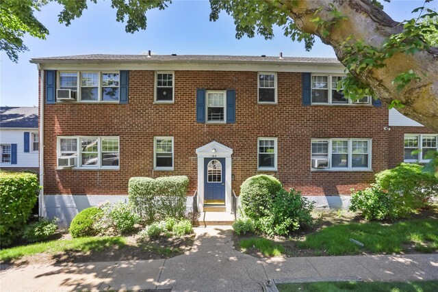 165 Columbus Ave Unit 1B, West Harrison, NY 10604 - view of front of property featuring brick siding and cooling unit