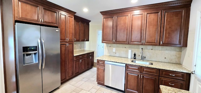 6 Arizona Ave, Syosset, NY 11791 - kitchen with appliances with stainless steel finishes, a sink, decorative backsplash, light stone countertops, and recessed lighting