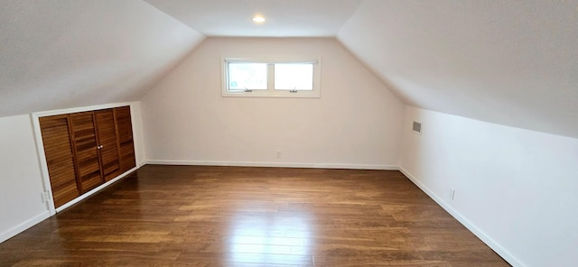 6 Arizona Ave, Syosset, NY 11791 - additional living space with wood finished floors, lofted ceiling, and baseboards