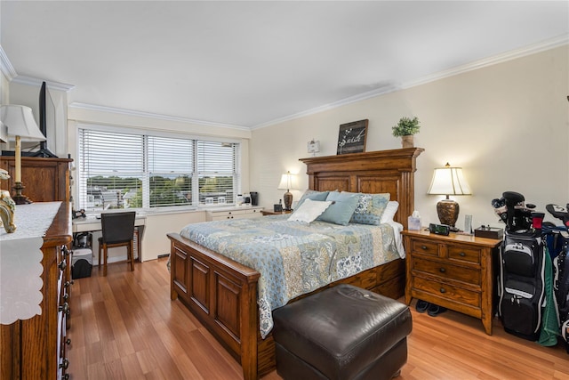 17-85 215th St Unit 4B, Bayside, NY 11360 - bedroom with light wood finished floors, crown molding, and an office area