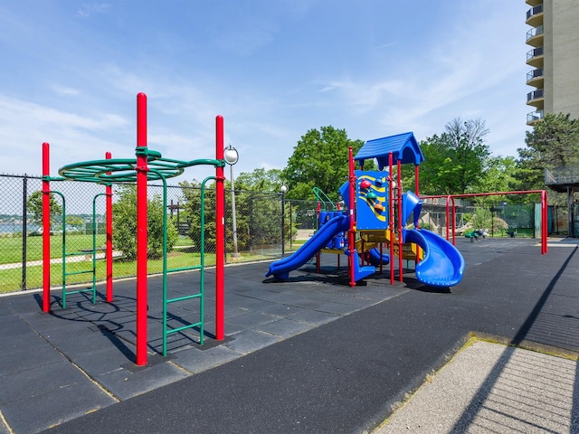17-85 215th St Unit 4B, Bayside, NY 11360 - community play area featuring fence