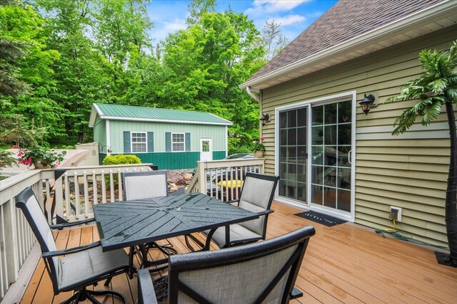 3 Pine Ln, Greenwood Lake, NY 10925 - wooden terrace featuring outdoor dining space and an outbuilding