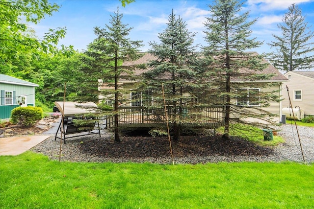 3 Pine Ln, Greenwood Lake, NY 10925 - rear view of house with a wooden deck and a yard