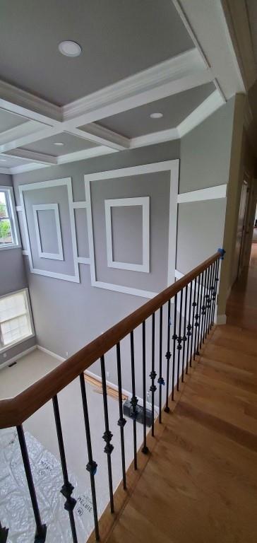 4 Coventry Ct, Wheatley Heights, NY 11798 - staircase with coffered ceiling, wood finished floors, baseboards, and beamed ceiling