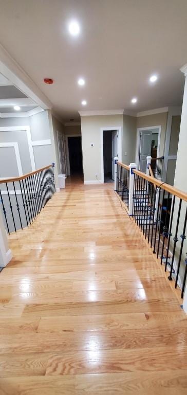 4 Coventry Ct, Wheatley Heights, NY 11798 - hallway with an upstairs landing, ornamental molding, light wood-style floors, recessed lighting, and baseboards
