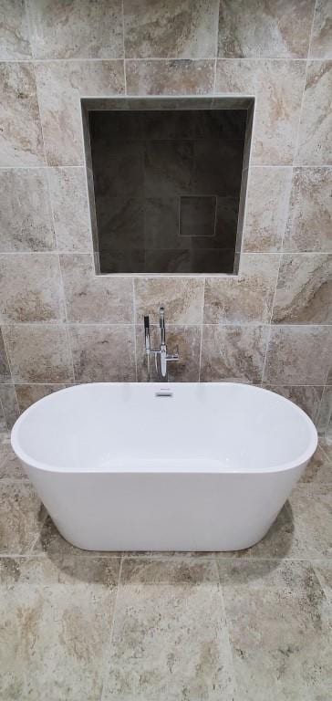 4 Coventry Ct, Wheatley Heights, NY 11798 - full bathroom featuring a freestanding tub and tile walls