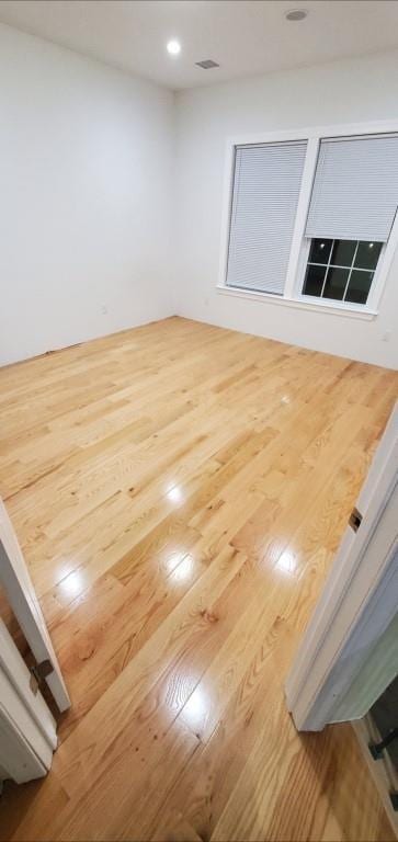 4 Coventry Ct, Wheatley Heights, NY 11798 - unfurnished room with wood finished floors