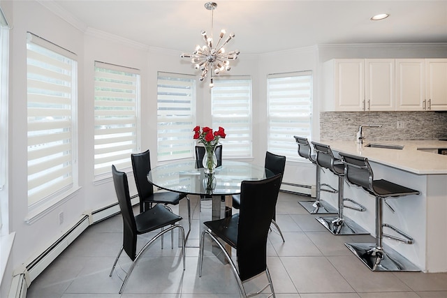 2448 6th Ave, East Meadow, NY 11554 - dining area with plenty of natural light, a chandelier, light tile patterned floors, ornamental molding, and recessed lighting