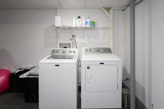 2448 6th Ave, East Meadow, NY 11554 - clothes washing area with washer and clothes dryer