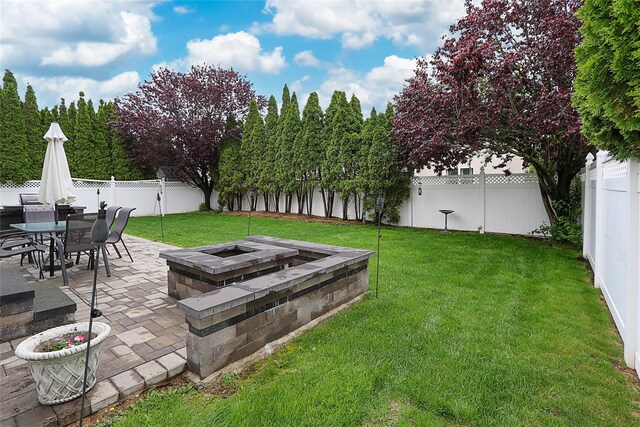 2448 6th Ave, East Meadow, NY 11554 - view of yard featuring a patio and a fire pit