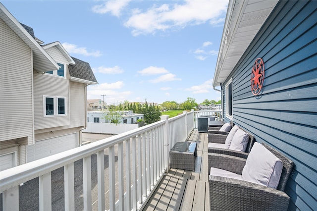 116 Westend Ave Unit 12, Freeport, NY 11520 - balcony featuring central air condition unit and outdoor lounge area