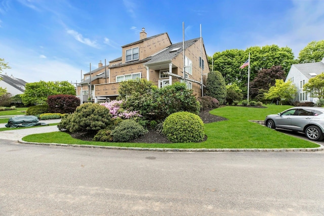 500 Meadow Ct Unit 28, Southold, NY 11971 - view of side of home featuring a yard