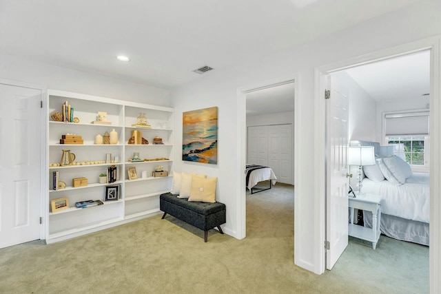 500 Meadow Ct Unit 28, Southold, NY 11971 - corridor featuring light carpet