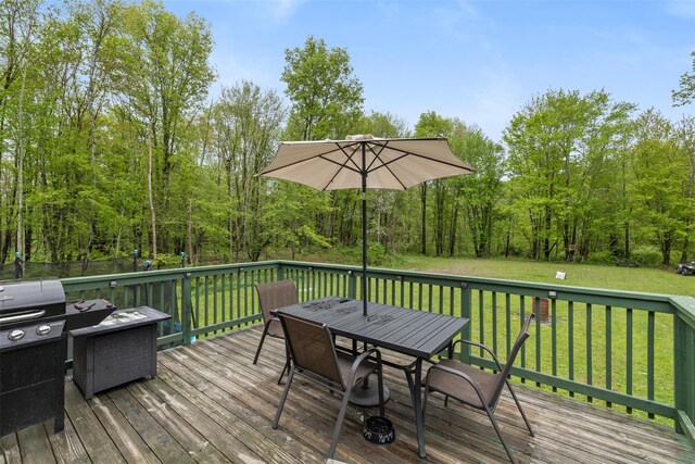 594 County Route 22, Middletown, NY 10940 - wooden deck with outdoor dining space and a yard