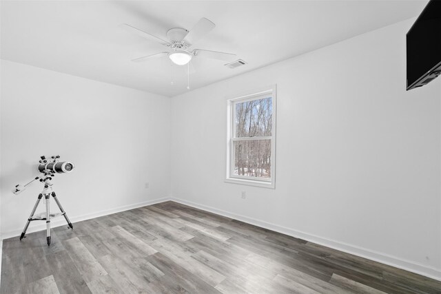 594 County Route 22, Middletown, NY 10940 - unfurnished room featuring wood finished floors, a ceiling fan, and baseboards
