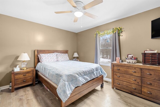 594 County Route 22, Middletown, NY 10940 - bedroom with light wood-style floors, baseboards, and ceiling fan
