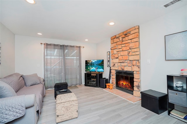 433 Arlene St, Staten Island, NY 10314 - living area with light wood-style flooring, a fireplace, and recessed lighting