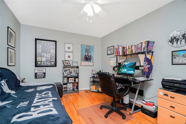 433 Arlene St, Staten Island, NY 10314 - bedroom with wood finished floors, an office area, baseboards, and ceiling fan