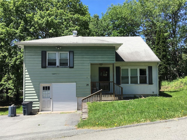 29 Nelshore Dr, Monticello, NY 12701 - view of front of home featuring asphalt driveway and a front yard