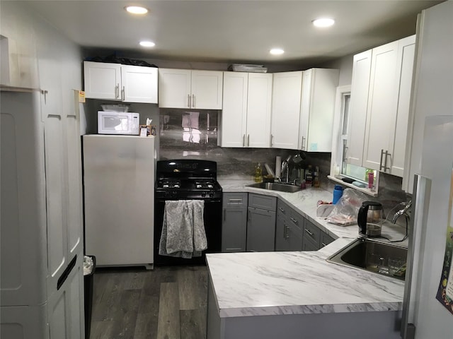 29 Nelshore Dr, Monticello, NY 12701 - kitchen featuring white appliances, a sink, dark wood-style flooring, gray cabinets, and recessed lighting