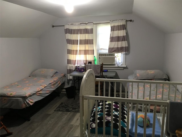 29 Nelshore Dr, Monticello, NY 12701 - bedroom featuring wood finished floors, lofted ceiling, and cooling unit