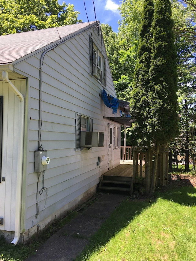 29 Nelshore Dr, Monticello, NY 12701 - view of side of property with a deck, a lawn, and a shingled roof