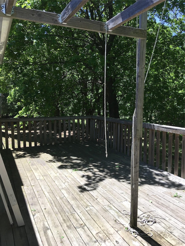 29 Nelshore Dr, Monticello, NY 12701 - wooden terrace featuring view of wooded area