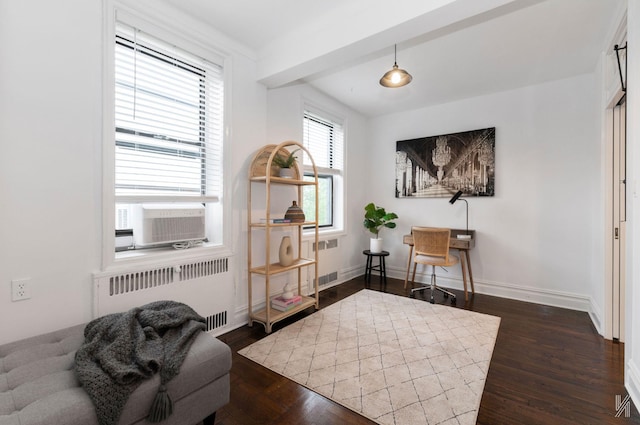 35-06 88th St Unit 5E, Jackson Heights, NY 11372 - living area featuring radiator heating unit, dark wood-style floors, cooling unit, and baseboards