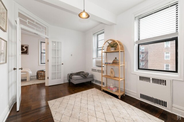 35-06 88th St Unit 5E, Jackson Heights, NY 11372 - sitting room featuring radiator, french doors, baseboards, and parquet floors