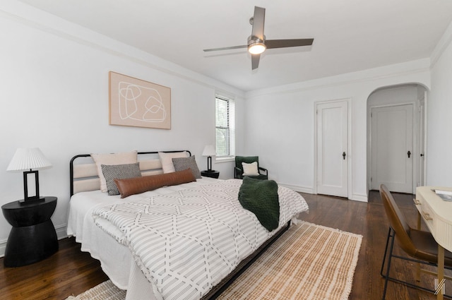 35-06 88th St Unit 5E, Jackson Heights, NY 11372 - bedroom featuring wood finished floors, arched walkways, and ceiling fan