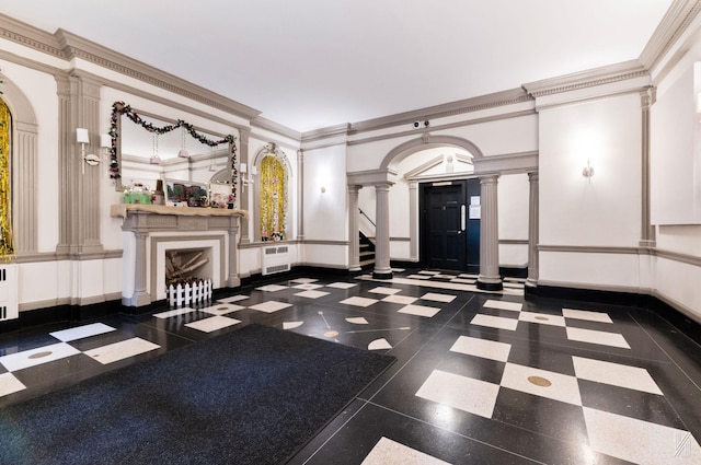 35-06 88th St Unit 5E, Jackson Heights, NY 11372 - building lobby with ornamental molding, a decorative wall, and stairway