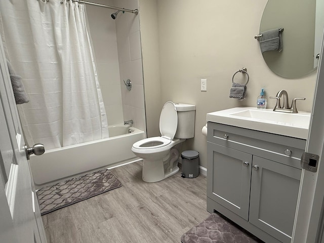 3412 Rte 52, Stormville, NY 12582 - full bath featuring wood finished floors, toilet, shower / tub combo, vanity, and baseboards