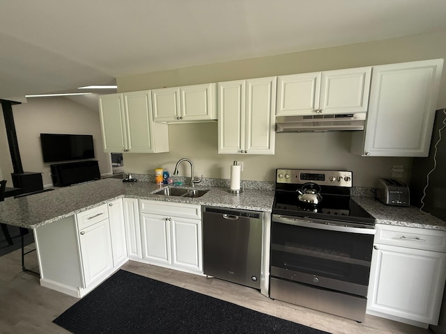 3412 Rte 52, Stormville, NY 12582 - kitchen with a sink, appliances with stainless steel finishes, under cabinet range hood, white cabinets, and light stone countertops