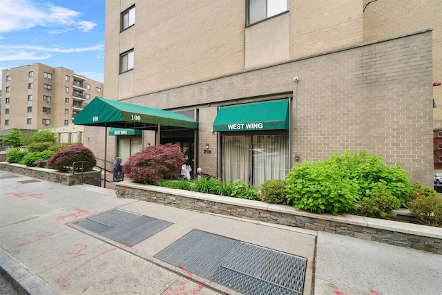 100 E Hartsdale Ave Unit Tfw, Hartsdale, NY 10530 - entrance to property with brick siding